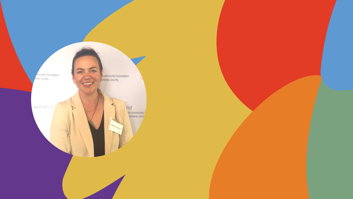 Circular headshot of a smiling woman on a colorful abstract background