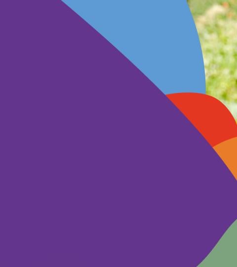 Colorful abstract shapes with a small photo of a smiling person outdoors